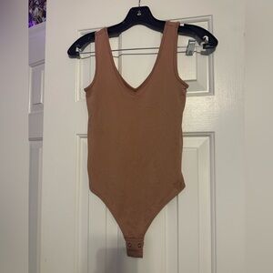 Brown v-neck SO body suit size xs